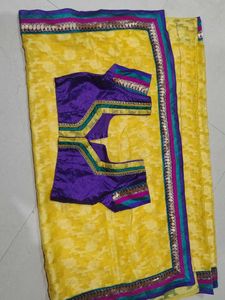Yellow Saree with stitch blouse
