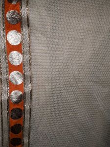 Cream Saree with Orange Delicate Border