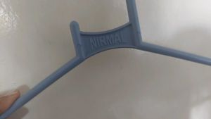 Clothes Hanger And Dust Pan