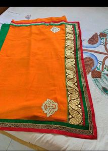 Elegant Orange Saree with Embroidery