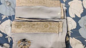Grey saree with gold border