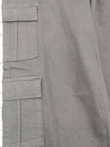 A Black Denim Jeans With 8 Pokets