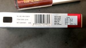 INSIGHT LIP GLOSS IN THE SHADE 06SHEER CORAL