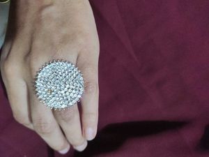 2 pair of gold plated pearl earrings with a stone