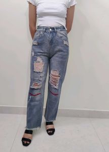 Women High-Rise Heavily Washed Distressed Jean