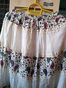 Beautiful  White Long Skirt With Printed Flowering Design Also With Lase