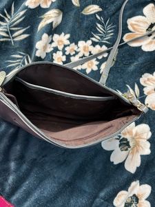 Branded Sling Bag.