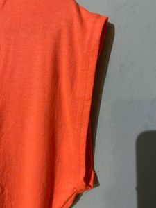Soft Fabric,Cute Orange Bold Colour Top With Topography Print,medium In Size Bust Size -32, Can Pair It With Black Pant Or Dark Blue Jeans