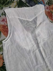 White Sleeveless Blouse