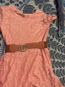 Knee Length Net Bright Peach Dress With Brown Belt