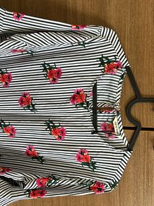 A Black Nd White Striped Formal Top