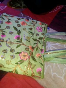A Beautiful Handbag With Embroidery Design