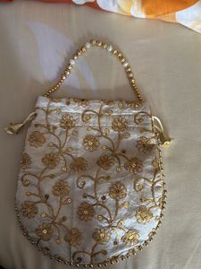 Embroidered Golden Potli