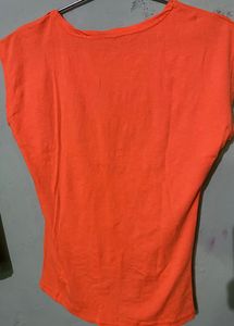 Soft Fabric,Cute Orange Bold Colour Top With Topography Print,medium In Size Bust Size -32, Can Pair It With Black Pant Or Dark Blue Jeans