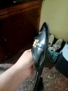 Black GEMEIQ Mules with Gold Accent