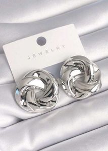 Silver Toned Spiral Curved Earings - 1 Pair