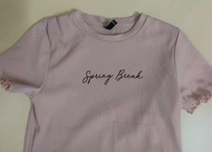 pink typography (knitted) top.