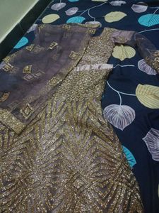 lehenga with small pipes like beads.