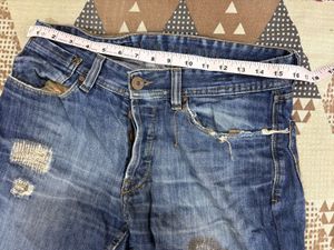 Combo of black shirt and blue straightfit jeans