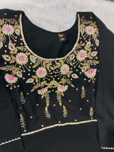 Yellow And Black Gown