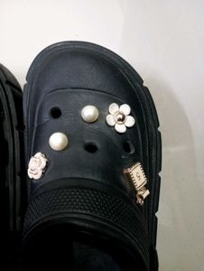 Platform Crocs with charms