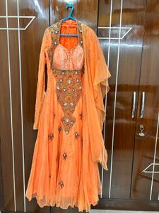 Designer Peach-Orange Gown with Embellished Bodice