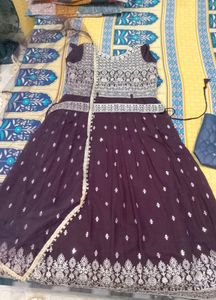 Elegant Purple Embroidered ethnic gowns