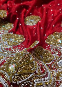 Red. heavy Embroidered. expansive 💯 saree