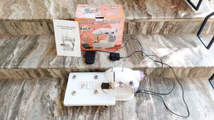 4 In 1 Mini Sewing Machine With