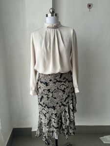 Elegant Blouse & Paisley Ruffle Skirt Set