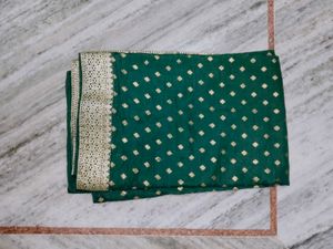 Green Saree with Gold Accents