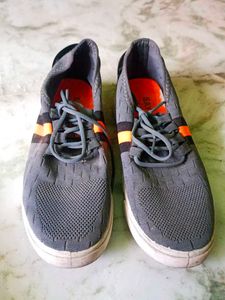 Gray and orange sneakers Ladies