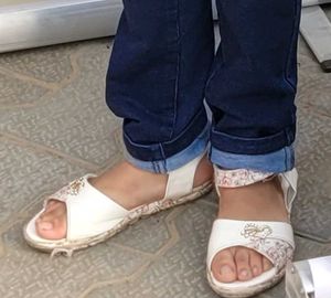 Stuning black sandal &amp; partywear white footwear
