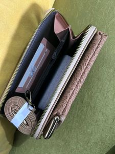 Brand New Venessa Tan Lace Clutch