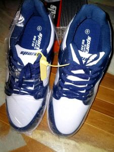 Men Colourblocked Black And White Sneakers.