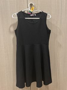 Black Flared Dress With Triangle Back Cutout