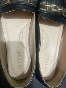 Black Loafers with Gold Detail