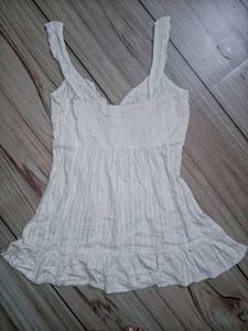 White Sleeveless Frill Top