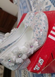 White Cinderela Shoes.