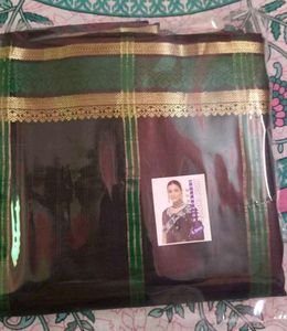 Elegant Black And Green Saree