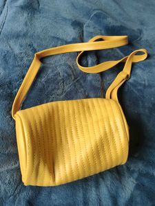 Circular Sides Stylish Mustard Sling Bag
