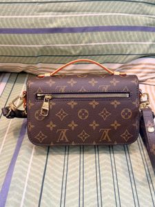 Authentic  Louis Vuitton  Metis East West