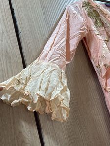 peach gown with cowl and attached drape