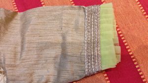 Golden Colour Blouse With Green Coloured Frill Det