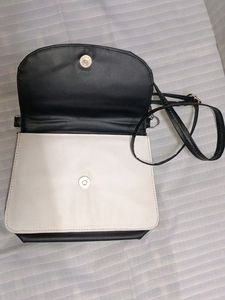 Charles And Keith Sling Purse(Blackndwhite) Copy