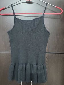 Sleeveless Black Peplum Top