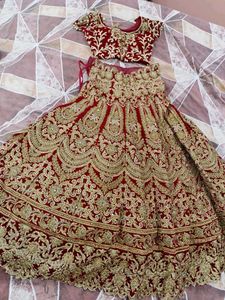 Red Bridal Lehenga With Beautiful Golden Work