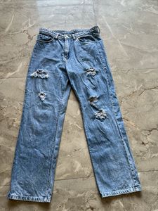 Ripped Blue Denim Jeans