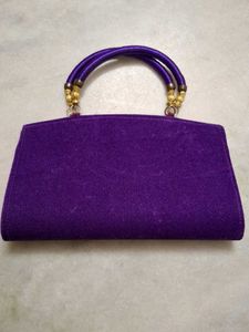 Red,rani pink, and purple Embroidered Clutches