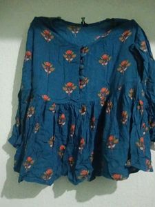 Tunics In Paplum Style